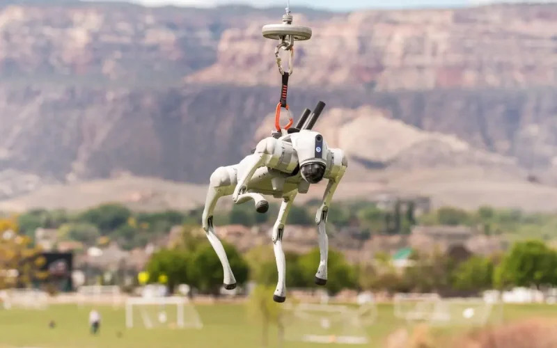 Robotic Dog being carried by large drone